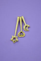 14k Wands all together. From left to right, the Star Wand, Fairy Heart Wand and Moon Wand. On a bright purple background.