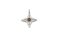 four pointed silver star pendant with a berry colored rose cut rhodolite garnet at the center. 