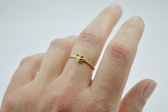  thin small heart ring on hand