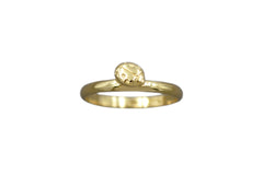 14k Gold Band with a ladybug sitting on it