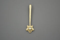 14k yellow gold star wand shaped pendant with a white diamond in the center of the star.