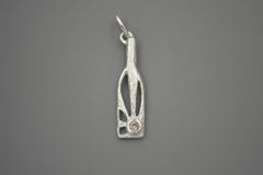 Silver bottle shaped pendant with rays within and sunstone gemstone