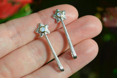 Two Silver and 14k star wand pendants with moonstone gemstone on fingertips
