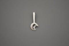 Silver moon wand pendant. The crescent moon shape sits at the end of a textured wand. 