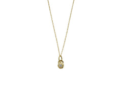14k yellow gold necklace with a tiny star shaped pendant that has a diamond set within.