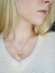 Sun necklace on model
