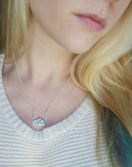 Mountain Necklace on model in silver