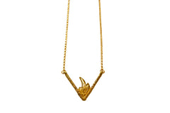 Gold necklace with triangular pendant