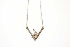 Silver necklace with triangular flame pendant