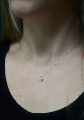 little heart necklace on