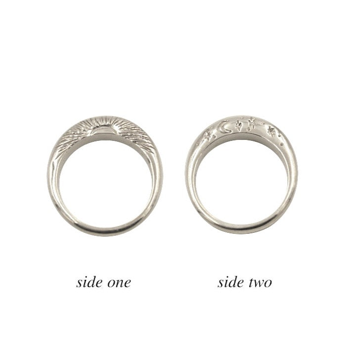 Night and Day Two Sided Ring in sterling silver. Shows one side of the ring with a hand carved rising sun and the other side of the ring with a crescent moon and twinkling stars.